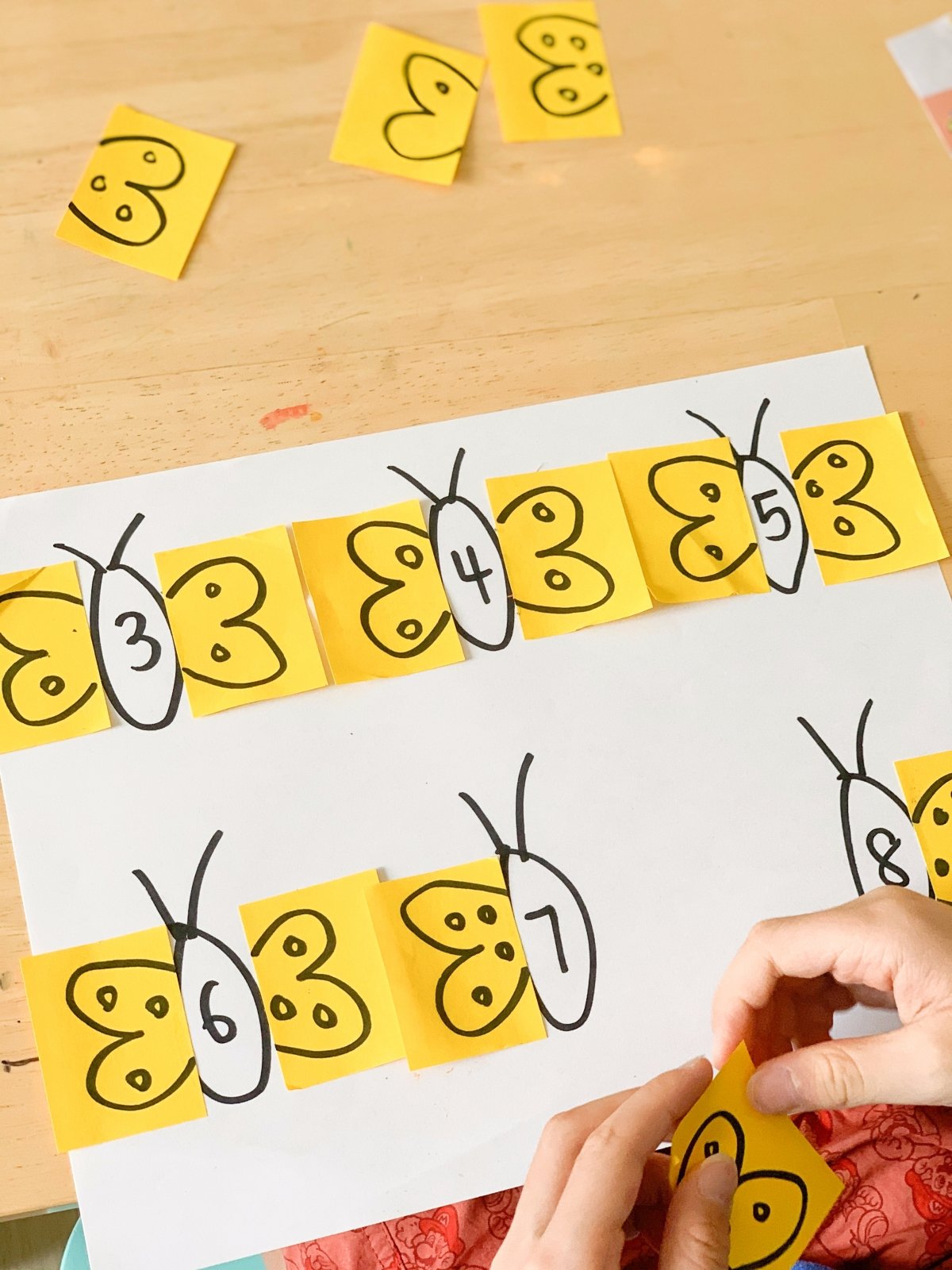 garden theme learning activities: sticky note addition butterfly