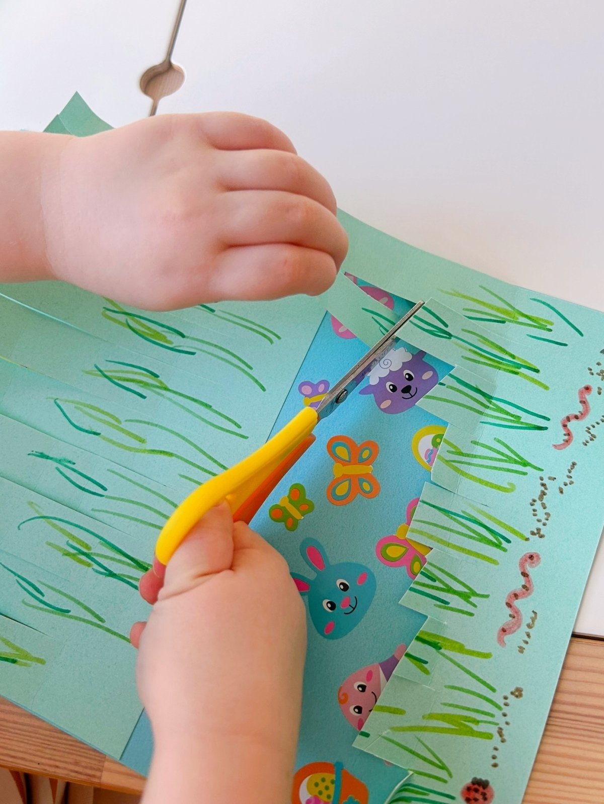 spring activity for children who are starting to learn to use a scissors