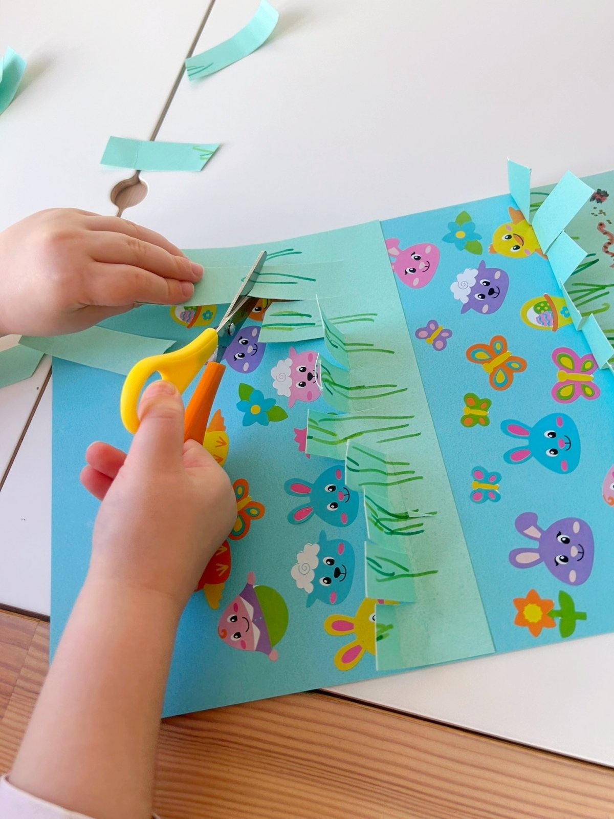 cut away the grass to reveal cute animals below