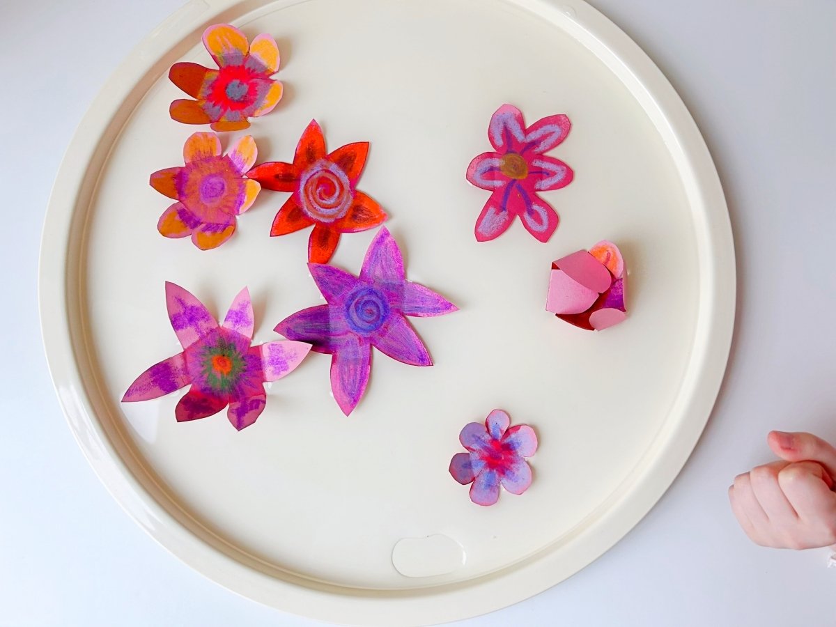 experiment with different types of paper, flower shapes and sizes